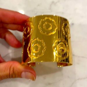 Gold flower power cuff